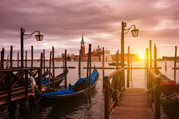 Plakat Gondolas in Venice on sunset next to San Marco square. Famous landmark in Italy