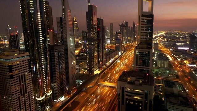 Hyper lapse Night To Day Illumination system Dubai Road Junction Traffic Roof Top View 4K Time Lapse Uae