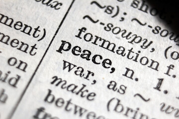 Definition of word peace on dictionary page, close-up