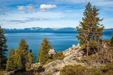 Fototapeta na wymiar Blue Water and the Sierra Nevada Mountains, Lake Tahoe