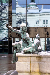 Leopold Fountain, sculpture covered with snow, Innsbruck, Austria