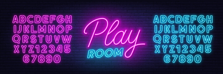 Play Room neon sign on brick wall background.