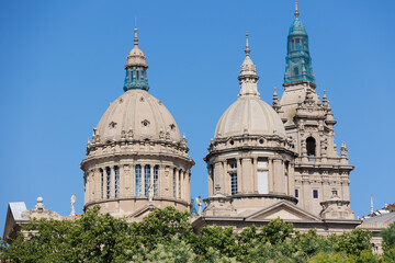 Fototapeta na wymiar Palau Nacional Domes, The National Palace is a Building on the Hill of Montjuic in Barcelona, Spain