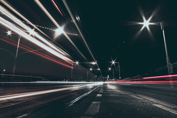 Fototapeta na wymiar city street at night with vehicles light trails