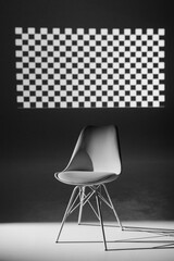 white modern chair on black and white background