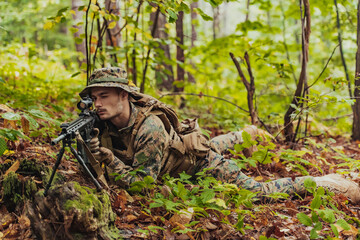 A modern warfare soldier on war duty in dense and dangerous forest areas. Dangerous military rescue...