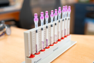 Blood collection tubes. Patients' blood ready for analysis in the laboratory. Blood bank. 