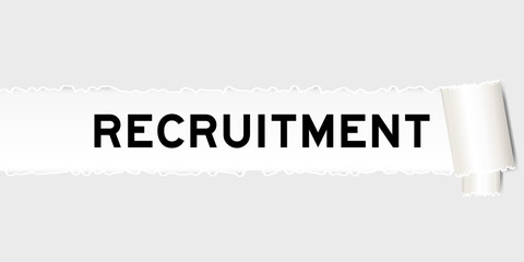 Ripped gray paper background that have word recruitment under torn part