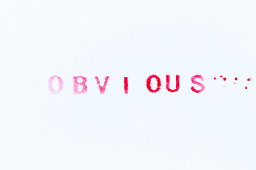 Red color ink rubber stamp in word obvious on white paper background