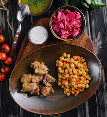 meat with chickpeas and soup - business lunch