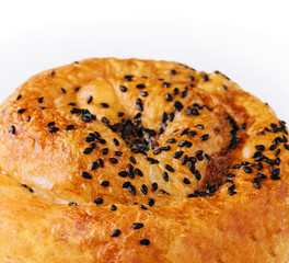 Fresh twisted bun with sesame seeds
