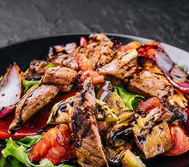 Vegetable and beef salad in a plate