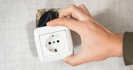 Dangerous bad,broken socket,plug in bathroom,falling out of wall. Outlet installation in old...