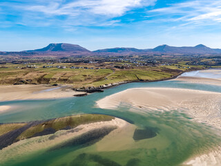 Aerial view of Ballyness Bay and Magheraroarty with the Muckish in the background in County Donegal - Ireland © Lukassek