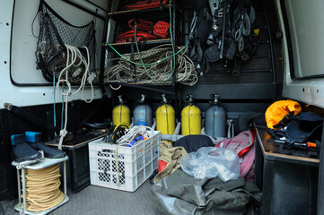 Rescue divers mobile post with a diving equipment set: balloons, wetsuits, buoys, bags