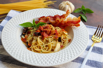 Spaghetti with bacon and dried chili at close up view - Spaghetti Aglio E Olio