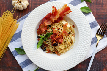 Spaghetti with bacon and dried chili at top view - Spaghetti Aglio E Olio