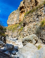 Hiking Trail Through Boulders and Streambed on The Devil's Hall Trail in Pine Springs Canyon, Guadalupe Mountains National Park, Texas, USA
