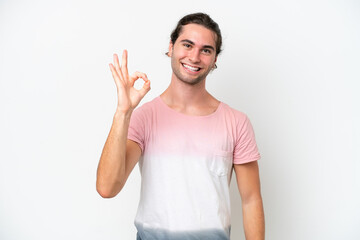 Caucasian handsome man isolated on white background showing ok sign with fingers