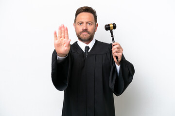 Middle age judge man isolated on white background making stop gesture