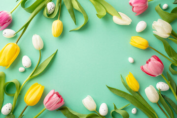 Easter celebration concept. Top view photo of quail eggs pink yellow and white tulips on isolated teal background with empty space in the middle