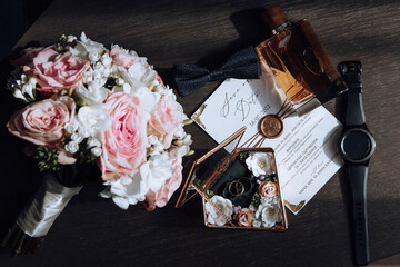 Morning groom and details, details of the groom brown. wedding details, gold wedding rings. Wedding...