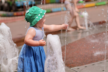 child in fountain