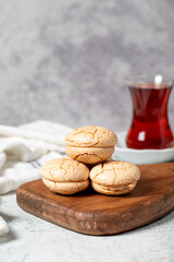 Almond cookies. Cookies made with almond flour on a stone background. Local name acibadem kurabiye. Patisserie sweets