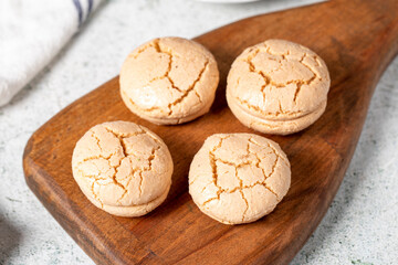 Almond cookies. Cookies made with almond flour on a stone background. Local name acibadem kurabiye. Patisserie sweets