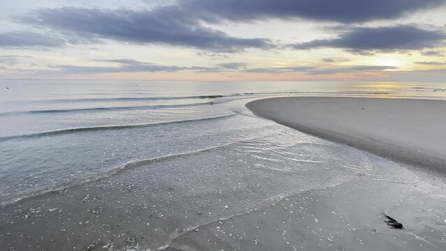 Ocean Trickles In Over the Low Tide Flats at Sunset at Chatham, Cape Cod