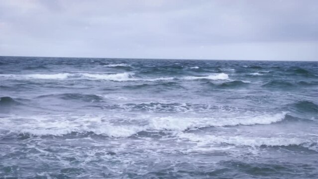 Stormy Ocean Waves Crash on a Beach at Chatham, Cape Cod in Winter
