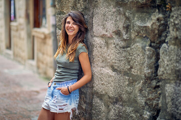 Portrait of a lovely brunette sightseeing oldtown