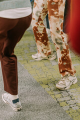 A close up photo of people dancing at the office