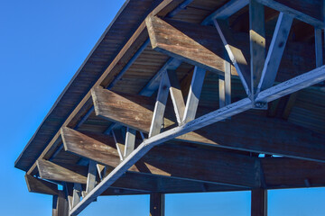 Standard timber framed building with close up on the roof trusses