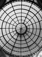dome of the galleria vittorio emanuele II black and white perspective photography noir style italy milan
