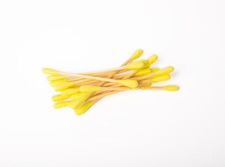 Cotton buds isolated on white background.Eco-friendly materials. Wooden, cotton swabs on a white background.Bamboo swabs.