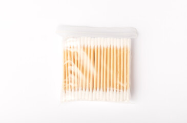 Cotton buds isolated on white background.Eco-friendly materials. Wooden, cotton swabs on a white background.Bamboo swabs.
