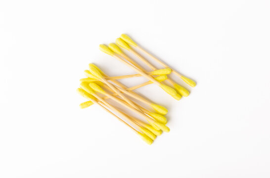 Cotton buds isolated on white background.Eco-friendly materials. Wooden, cotton swabs on a white background.Bamboo swabs.