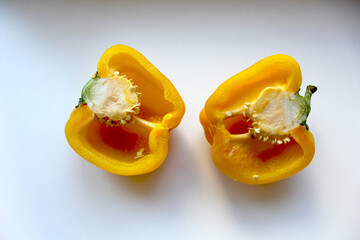 three peppers on a white background