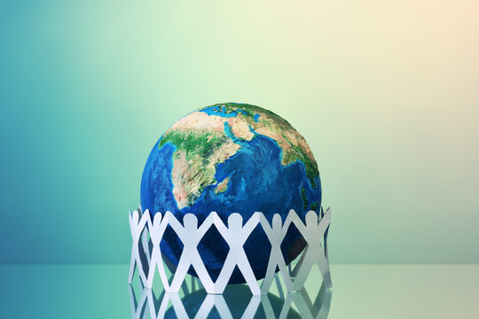 Earth globe with paper men