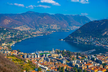 Fototapeta na wymiar The city of Como, the lake, the lakeside promenade, the buildings, photographed from above. 