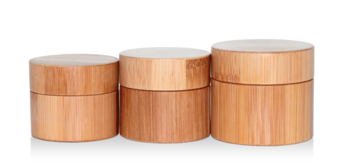 Wooden cosmetic cream jar isolated white background. Eco cosmetics and zero waste concept