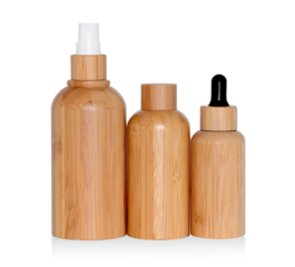 Wooden cosmetic dropper bottles isolated white background. Eco cosmetics and zero waste concept 