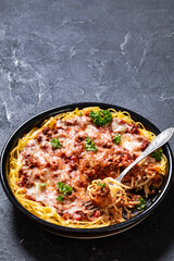 baked spaghetti with ground beef, sauce, cheese