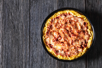 baked spaghetti with ground beef, sauce, cheese