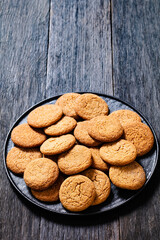 sweet soft ginger cookies on plate, top view