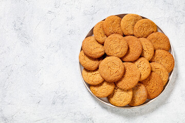 sweet soft ginger cookies on plate, top view