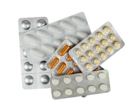 Set of different tablets, pills and capsules on transparent background