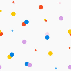 Vector seamless pattern with colorful dots on a white background. Repetitive elements. Childrens illustration for design, textile, wrapping paper. Vector stock illustration.
