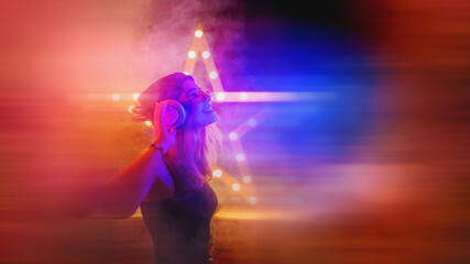 Background room with dancing girl in headphones - spotlights and lights, abstract purple background...